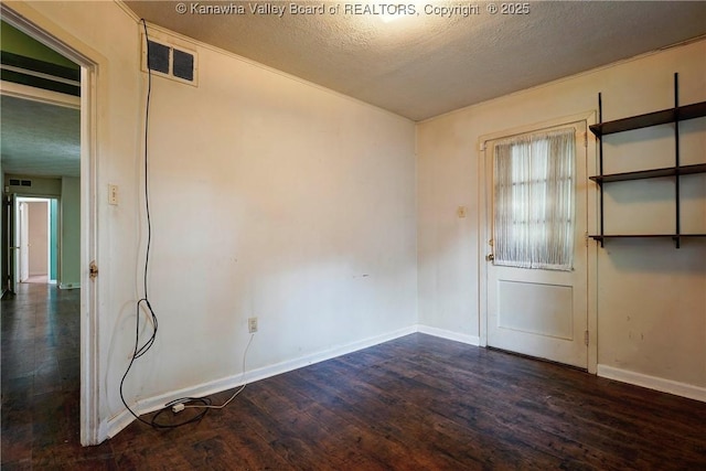 2620 Bard Ave, Saint Albans, WV 25177 - unfurnished room with dark wood-style floors and a textured ceiling