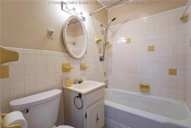 2620 Bard Ave, Saint Albans, WV 25177 - full bathroom featuring shower / bath combination, vanity, and tile walls