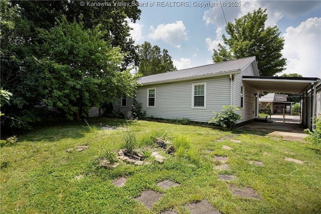 2620 Bard Ave, Saint Albans, WV 25177 - view of property exterior with a yard, a metal roof, and a carport