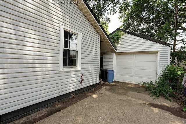 2620 Bard Ave, Saint Albans, WV 25177 - view of property exterior featuring concrete driveway, a garage, and an outbuilding