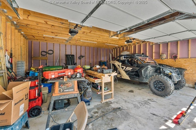 4862 Mont Union Rd, Fraziers Bottom, WV 25082 - garage featuring a garage door opener