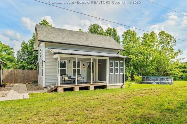 4862 Mont Union Rd, Fraziers Bottom, WV 25082 - back of house featuring an outdoor pool and a porch