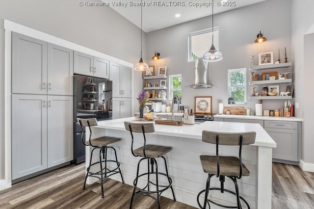 4862 Mont Union Rd, Fraziers Bottom, WV 25082 - kitchen featuring open shelves, a towering ceiling, gray cabinets, light countertops, and recessed lighting