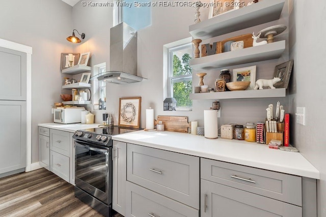 4862 Mont Union Rd, Fraziers Bottom, WV 25082 - kitchen featuring open shelves, stainless steel range with electric stovetop, wall chimney range hood, dark wood finished floors, and gray cabinetry