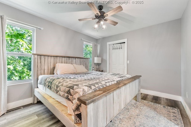 4862 Mont Union Rd, Fraziers Bottom, WV 25082 - bedroom featuring wood finished floors and a ceiling fan