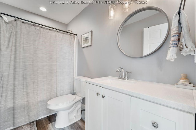 4862 Mont Union Rd, Fraziers Bottom, WV 25082 - full bathroom featuring vanity and wood finished floors