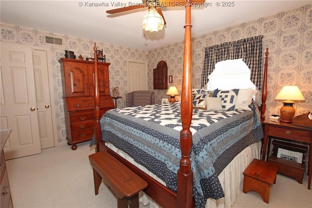 5445 Longview Dr, Cross Lanes, WV 25313 - carpeted bedroom with wallpapered walls and ceiling fan