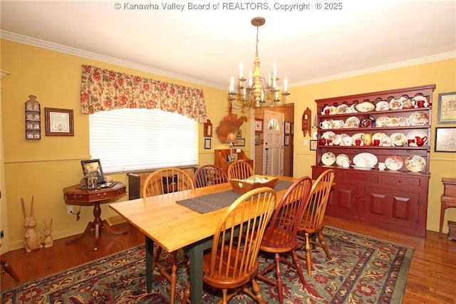 5445 Longview Dr, Cross Lanes, WV 25313 - dining area with a chandelier, crown molding, and wood finished floors