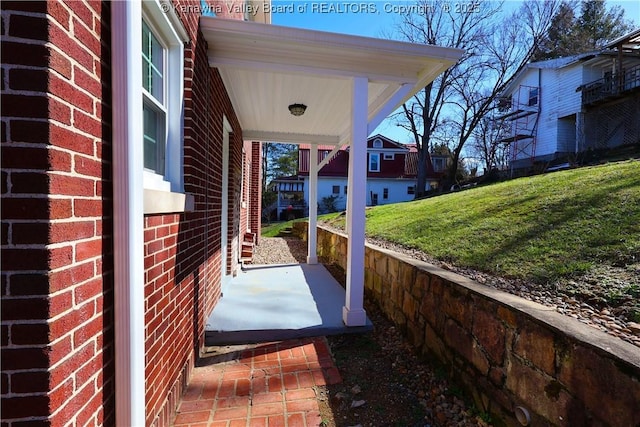 927 Ridgemont Rd, Charleston, WV 25314 - covered porch featuring a yard