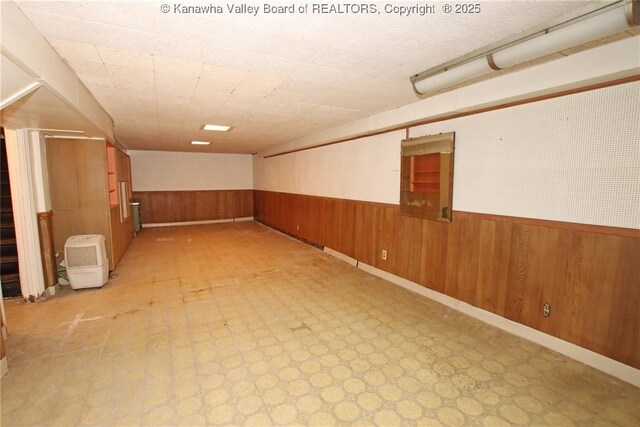 4312 Lancaster Ave, Charleston, WV 25304 - finished basement with wainscoting, light flooring, and wooden walls