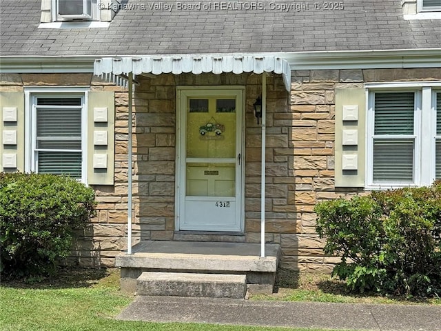 4312 Lancaster Ave, Charleston, WV 25304 - property entrance with stone siding and roof with shingles