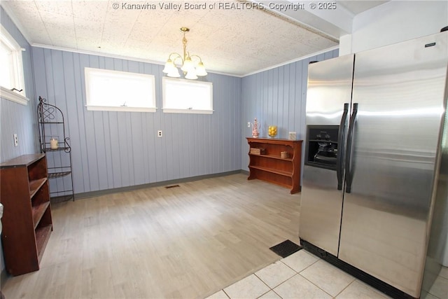 4312 Lancaster Ave, Charleston, WV 25304 - kitchen with stainless steel fridge with ice dispenser, a chandelier, plenty of natural light, light wood-style floors, and ornamental molding