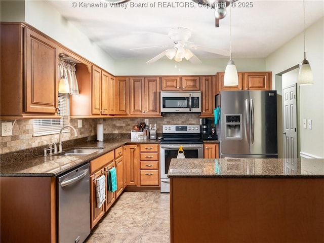150 Timberlake Cir, Scott Depot, WV 25560 - kitchen featuring stainless steel appliances, tasteful backsplash, pendant lighting, and a ceiling fan