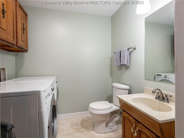 150 Timberlake Cir, Scott Depot, WV 25560 - bathroom featuring washer and dryer and vanity
