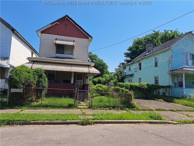 1424 3rd Ave, Charleston, WV 25387 - view of front of home with covered porch and a gate
