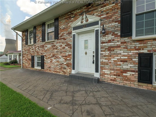 123 Dodd St, Poca, WV 25159 - view of exterior entry with brick siding