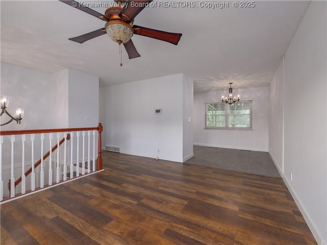 123 Dodd St, Poca, WV 25159 - unfurnished room with a chandelier, wood finished floors, and ceiling fan