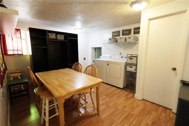 442 Porter Rd, Charleston, WV 25314 - dining space featuring washer and clothes dryer and light wood-style floors