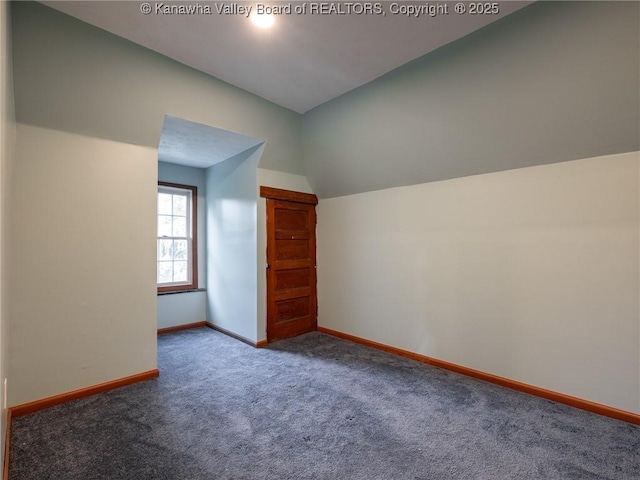623 11th Ave, Huntington, WV 25701 - additional living space featuring vaulted ceiling and carpet