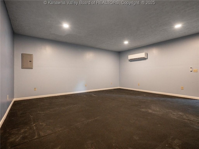 623 11th Ave, Huntington, WV 25701 - carpeted spare room featuring a wall mounted AC, recessed lighting, electric panel, and a textured ceiling