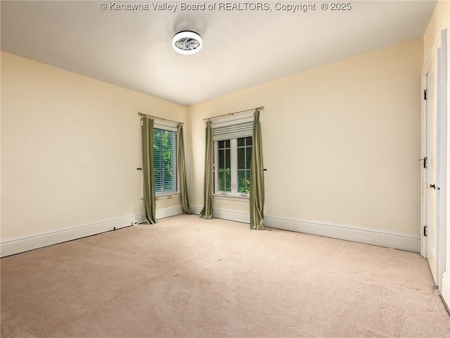 623 11th Ave, Huntington, WV 25701 - carpeted empty room featuring baseboards