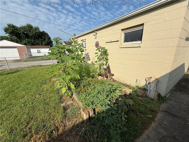 448 18th St, Dunbar, WV 25064 - view of home's exterior with a garage