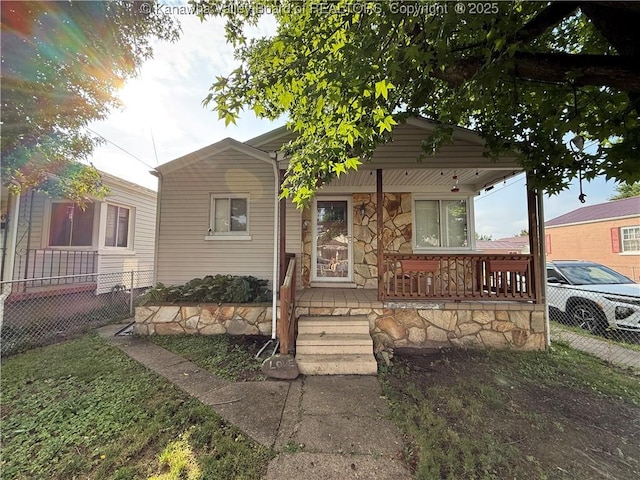 448 18th St, Dunbar, WV 25064 - view of front of house featuring covered porch and stone siding