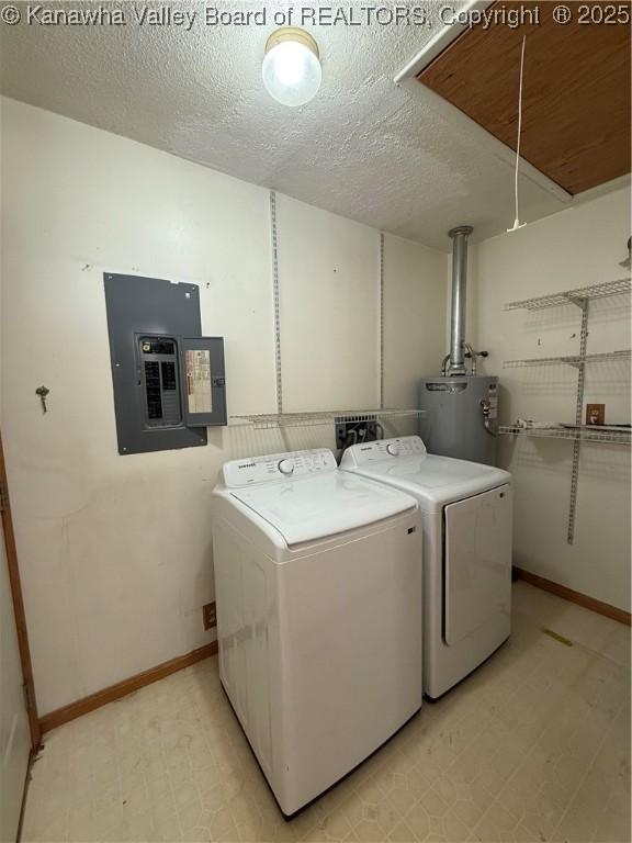 448 18th St, Dunbar, WV 25064 - laundry room featuring electric panel, water heater, washing machine and clothes dryer, attic access, and a textured ceiling