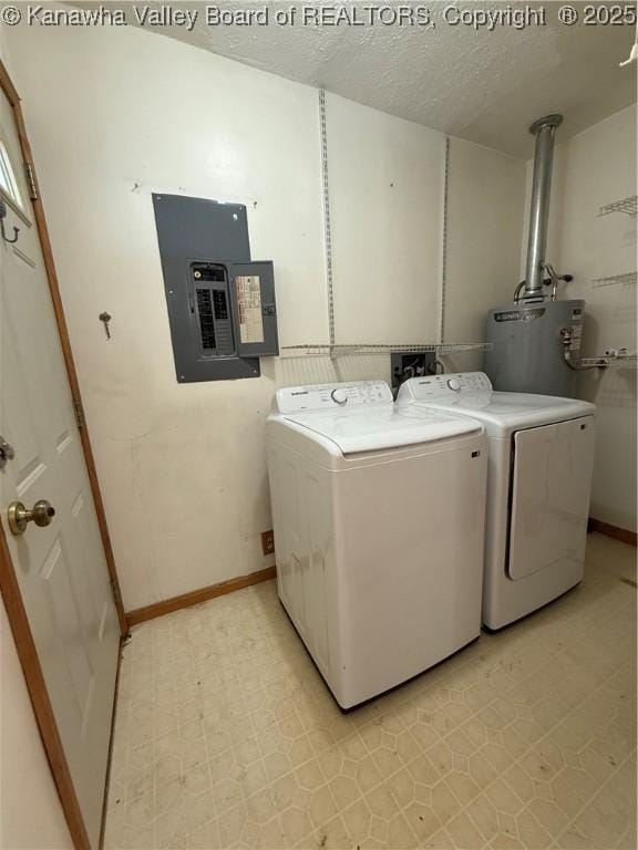 448 18th St, Dunbar, WV 25064 - laundry area featuring electric panel, washing machine and clothes dryer, water heater, a textured ceiling, and light flooring