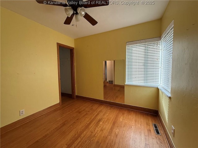 448 18th St, Dunbar, WV 25064 - unfurnished room with ceiling fan and wood finished floors