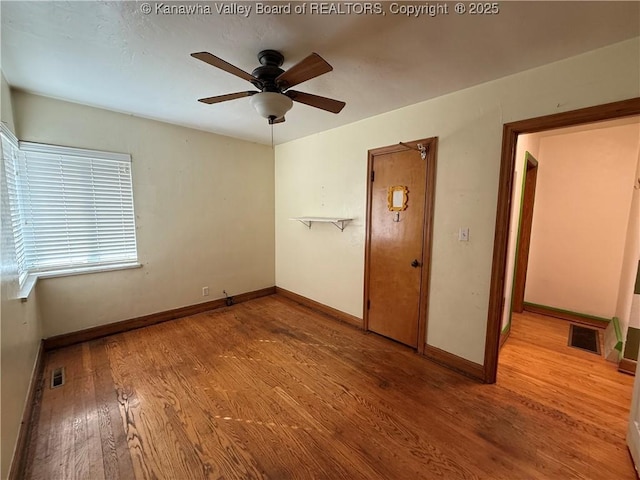 448 18th St, Dunbar, WV 25064 - unfurnished bedroom featuring wood finished floors and baseboards