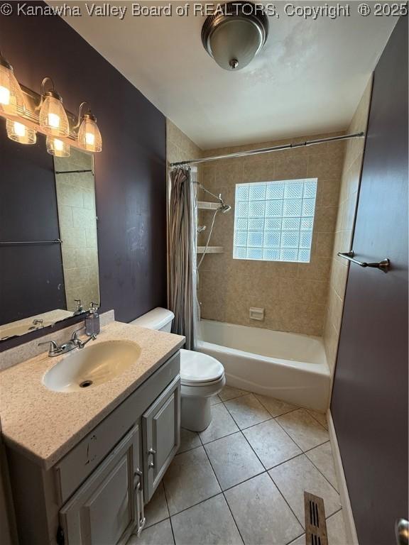 448 18th St, Dunbar, WV 25064 - full bath with vanity, tile patterned floors, and shower / bath combination with curtain