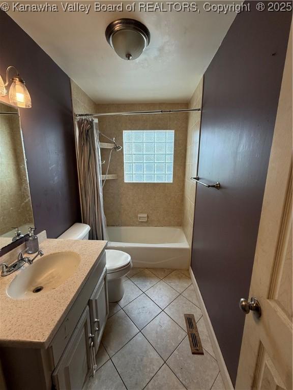 448 18th St, Dunbar, WV 25064 - full bathroom featuring vanity, tile patterned floors, and shower / bath combo