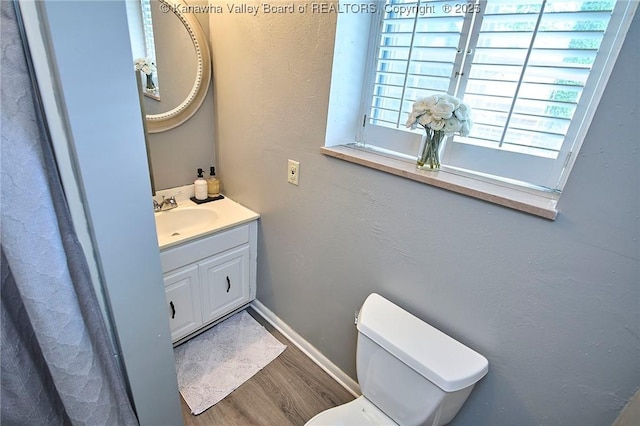 1501 Brentwood Rd, Charleston, WV 25314 - bathroom with wood finished floors and vanity