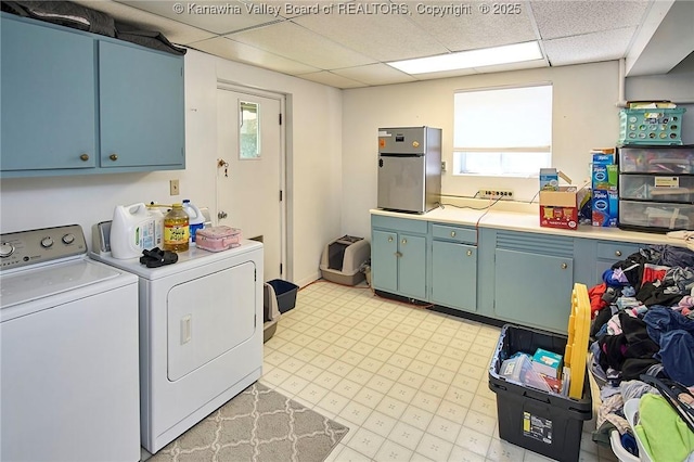 1501 Brentwood Rd, Charleston, WV 25314 - washroom featuring cabinet space, washing machine and clothes dryer, and plenty of natural light