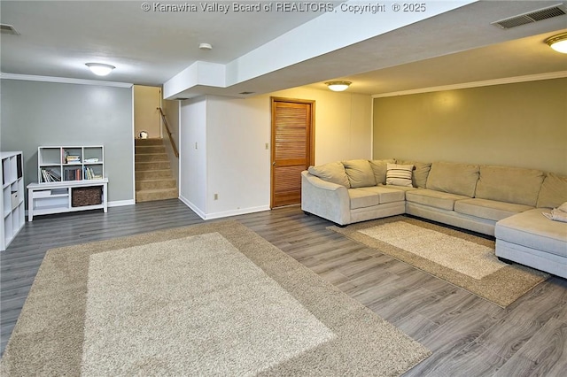 1501 Brentwood Rd, Charleston, WV 25314 - living room with dark wood-style floors, crown molding, and stairway