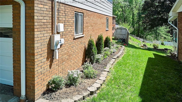 1501 Brentwood Rd, Charleston, WV 25314 - view of property exterior with a storage unit and brick siding