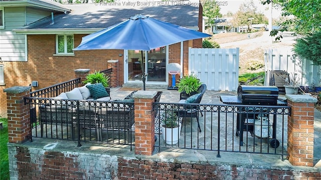1501 Brentwood Rd, Charleston, WV 25314 - view of patio with a fenced front yard, outdoor lounge area, and a gate