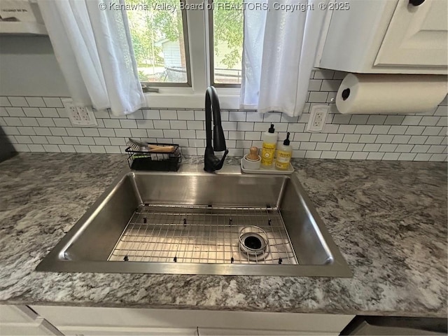 1501 Brentwood Rd, Charleston, WV 25314 - kitchen view of decorative backsplash and white cabinetry