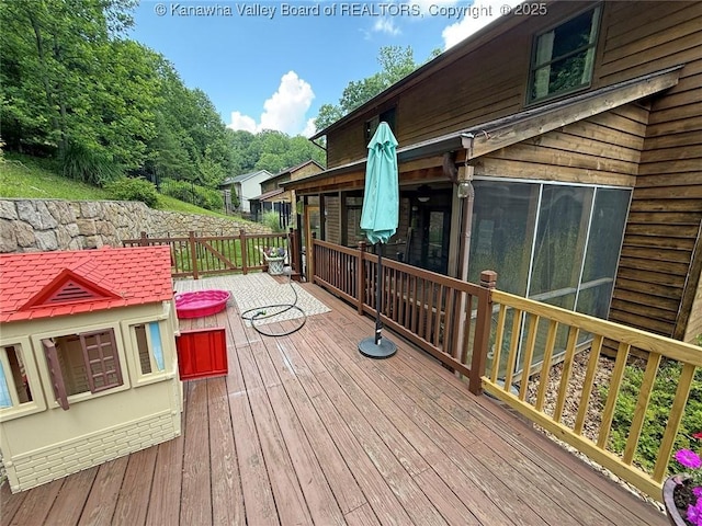 119 Falls Run Rd, Charleston, WV 25311 - wooden deck featuring a sunroom