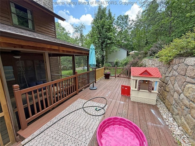 119 Falls Run Rd, Charleston, WV 25311 - wooden deck with a sunroom