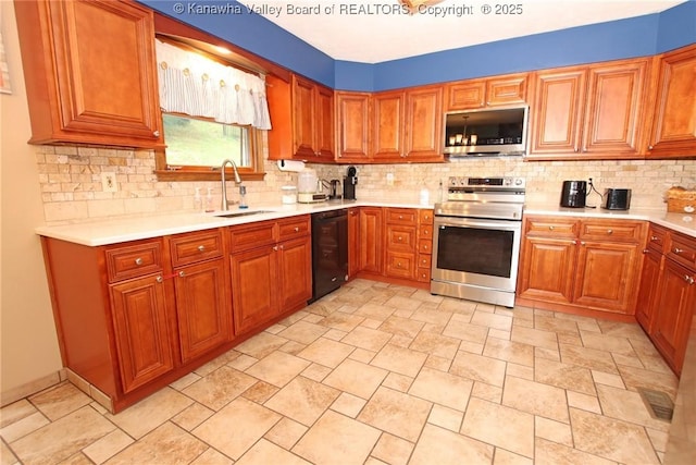 119 Falls Run Rd, Charleston, WV 25311 - kitchen with stainless steel appliances, light countertops, tasteful backsplash, and light stone finish floors