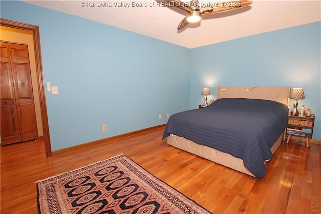 119 Falls Run Rd, Charleston, WV 25311 - bedroom featuring wood finished floors and a ceiling fan