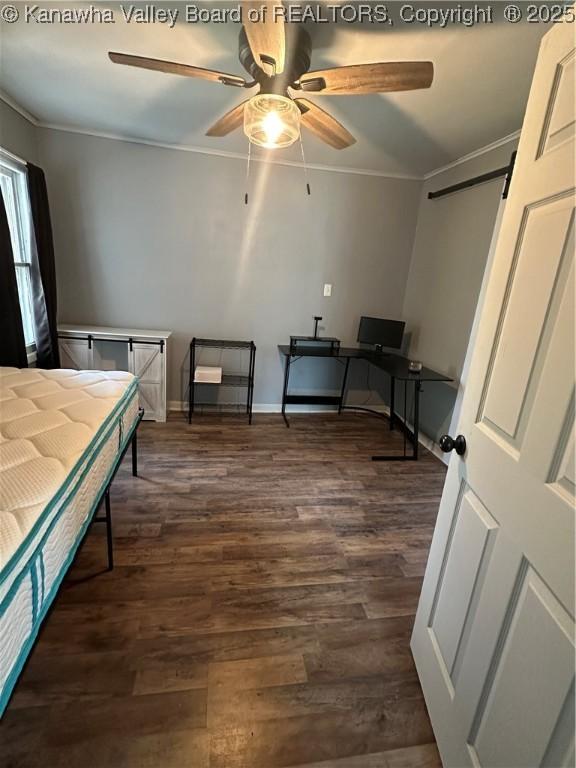 1110 Benamati Ave, Nitro, WV 25143 - bedroom with ornamental molding, dark wood-style flooring, an office area, and ceiling fan