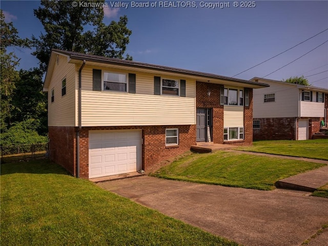 1105 Hollyberry Ln, South Charleston, WV 25309 - raised ranch featuring brick siding, driveway, and a garage