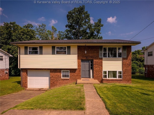 1105 Hollyberry Ln, South Charleston, WV 25309 - raised ranch with concrete driveway, a front lawn, brick siding, and a garage