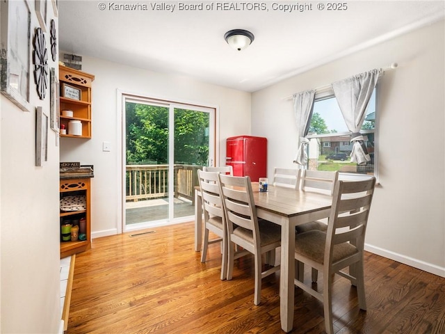 1105 Hollyberry Ln, South Charleston, WV 25309 - dining area with wood finished floors and baseboards