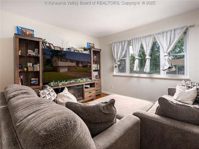 1105 Hollyberry Ln, South Charleston, WV 25309 - living room with healthy amount of natural light and wood finished floors