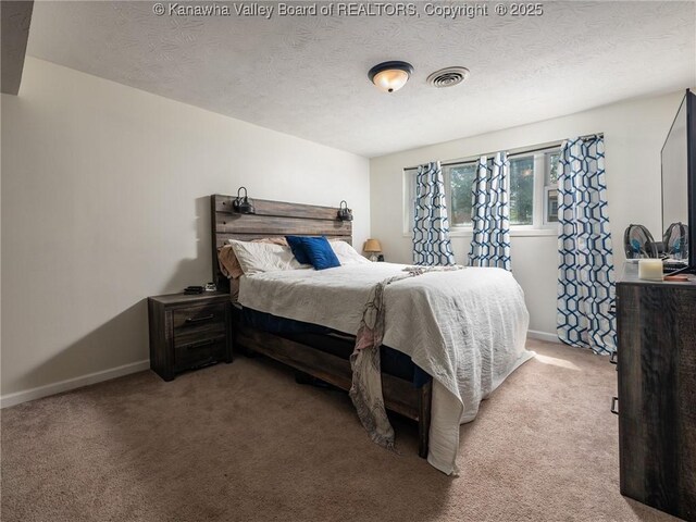 1105 Hollyberry Ln, South Charleston, WV 25309 - carpeted bedroom with baseboards and a textured ceiling