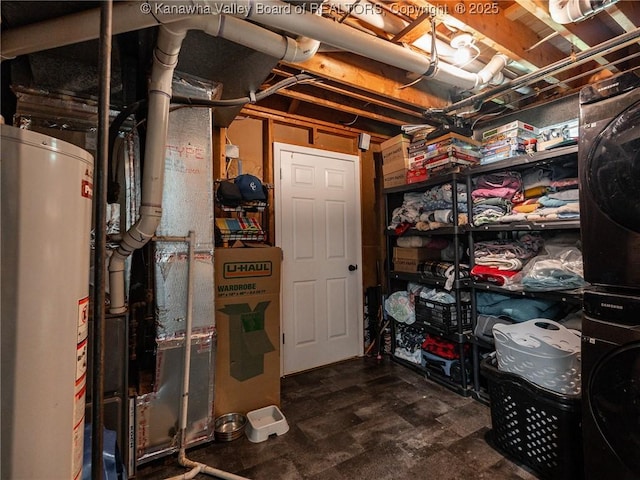 1105 Hollyberry Ln, South Charleston, WV 25309 - unfinished below grade area with gas water heater and stacked washer / drying machine